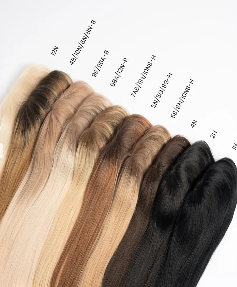 BHBD:s hair toppers i tio färger, från ljusblont till svart, utlagda i rad